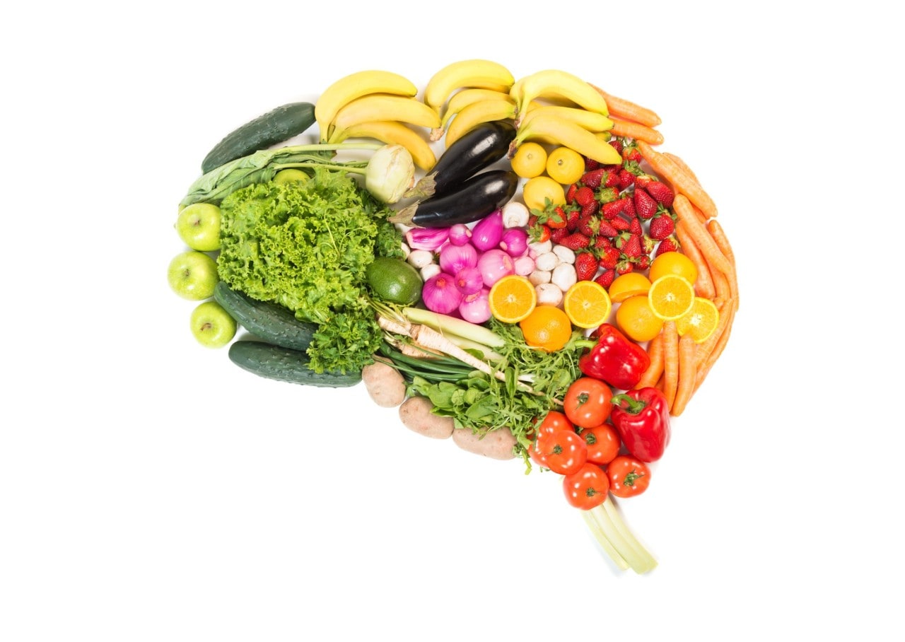 Brain made out of fruits and vegetables isolated on white background